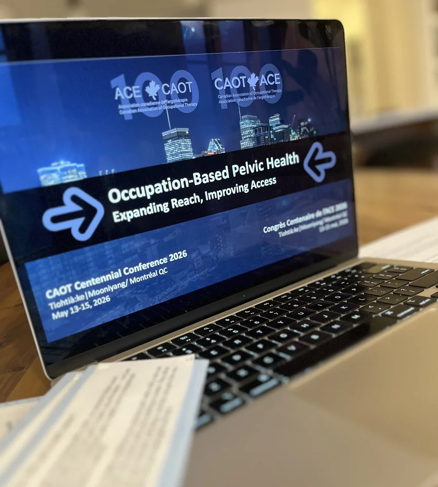 A laptop open on a slide from the CAOT Centennial Conference: “Occupation-Based Pelvic Health”